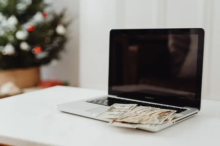 watching videos on laptop earning money